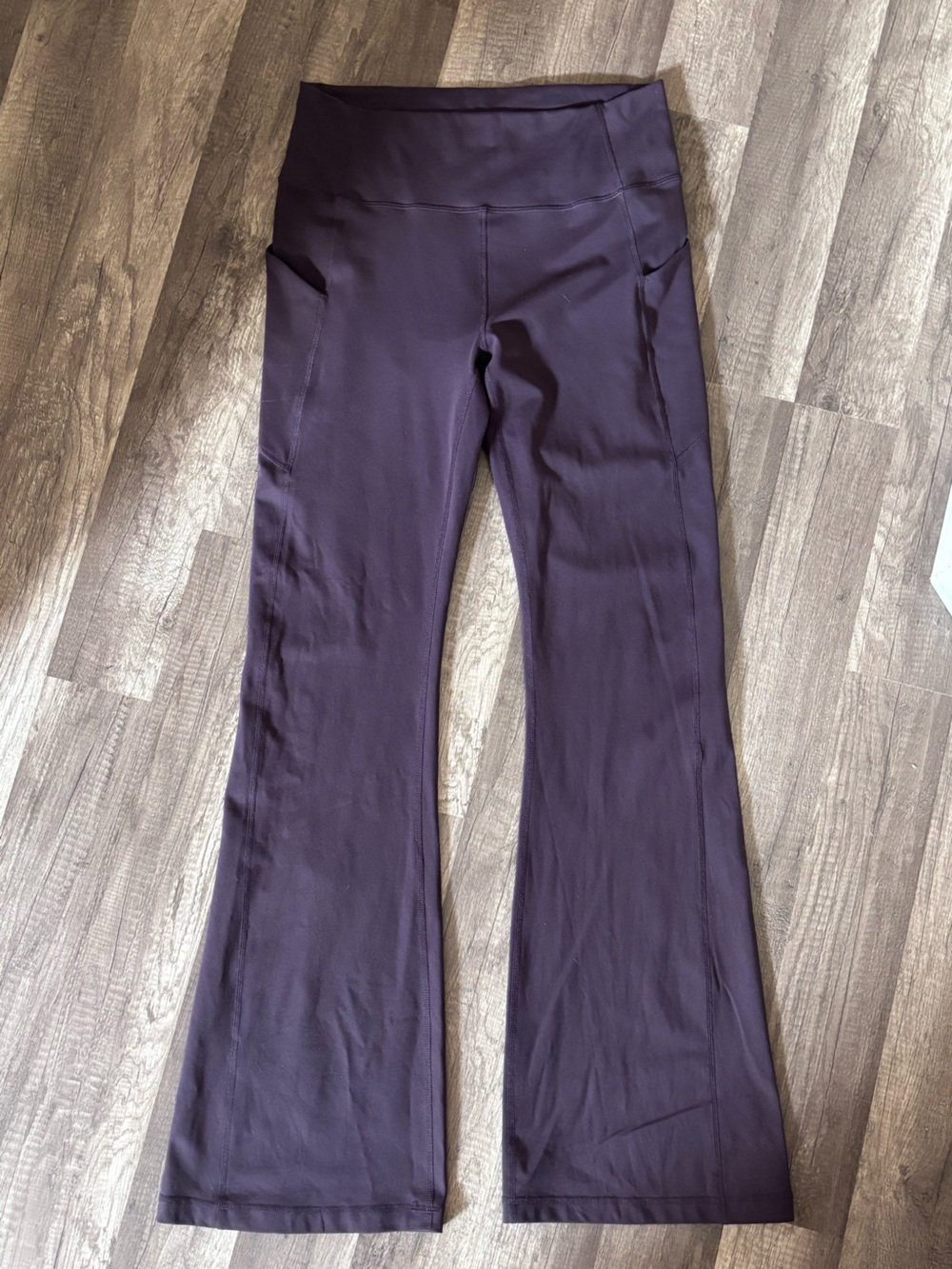 Fabletics Pure Luxe Flare Leggings in Deep Plum